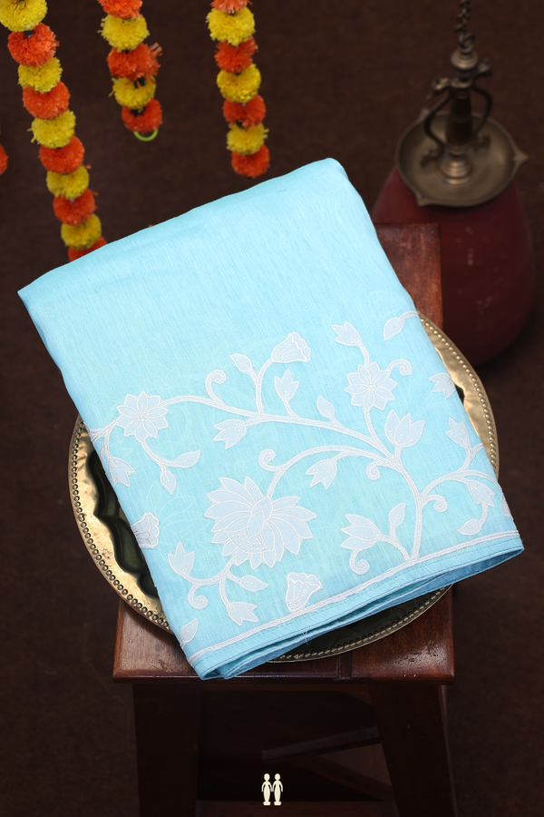 Linen Saree In Plain Sky Blue With Floral Border