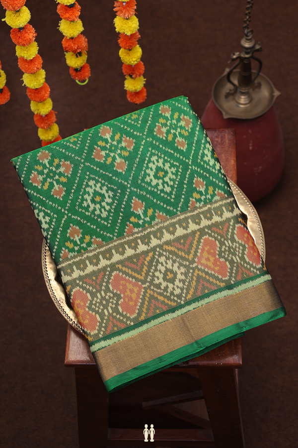 Patola Silk Saree In Emerald Green With Diamond Design