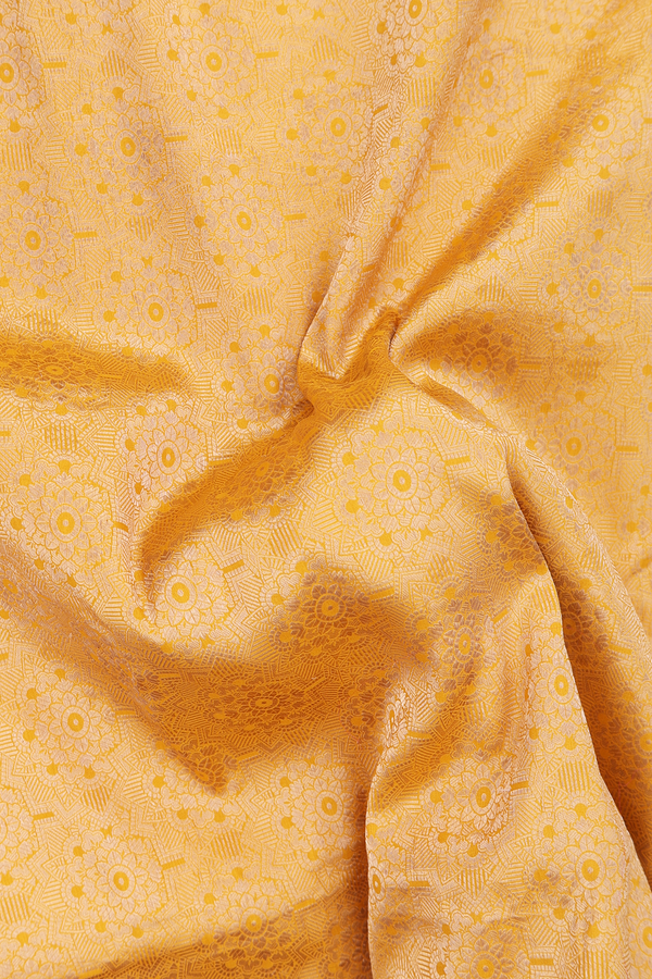 Banarasi Silk Saree In Saffron Yellow With Floral Design