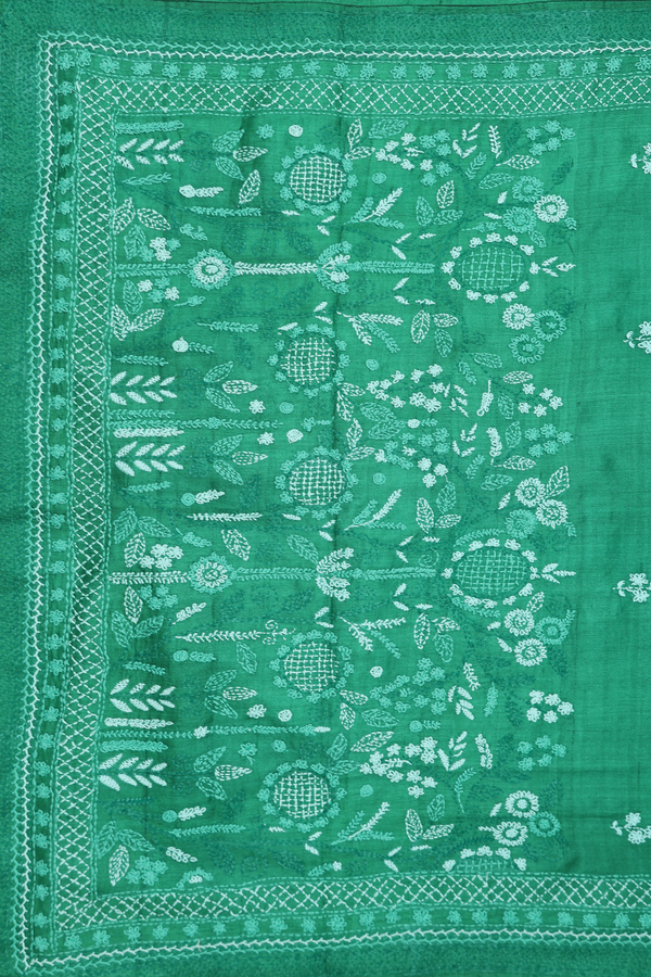 Tussar Silk Saree In Green With Floral Embroidered Buttas