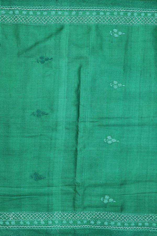 Tussar Silk Saree In Green With Floral Embroidered Buttas