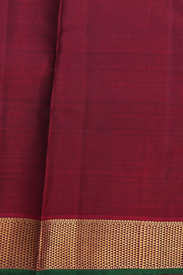 Kanchipuram Silk Saree In Pine Green With Peacock Buttas