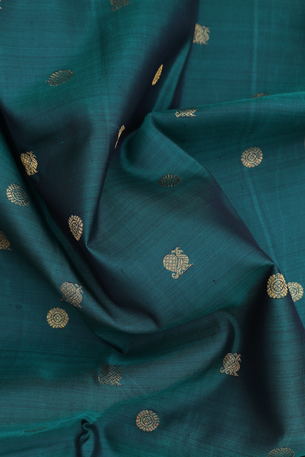 Kanchipuram Silk Saree In Pine Green With Peacock Buttas