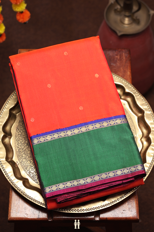 Kanchipuram Silk Saree In Spiced Orange With Floral Buttis