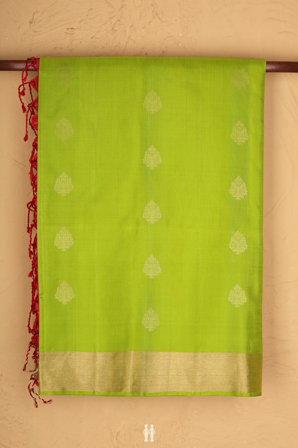 Soft Silk Saree In Parrot Green With Floral Buttas