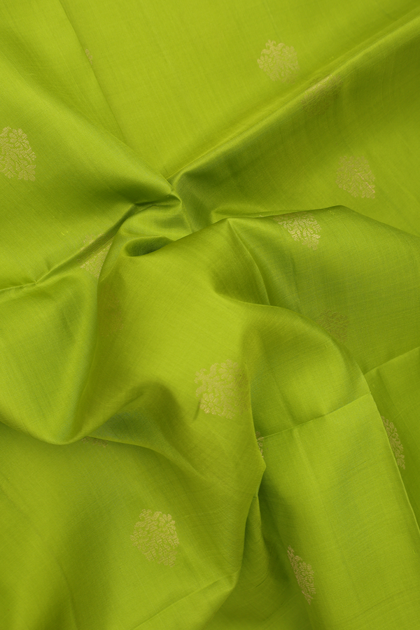 Soft Silk Saree In Parrot Green With Floral Buttas