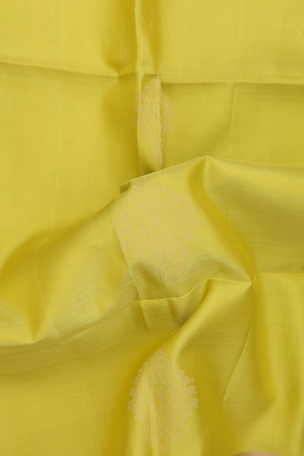 Soft Silk Saree In Lime Yellow With Zari Motifs