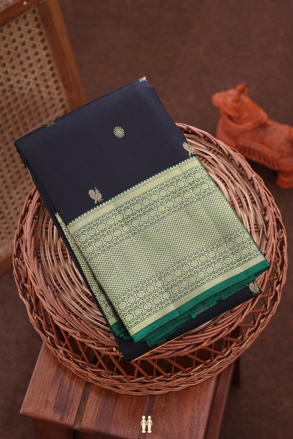 Kanchipuram Silk Saree In Black With Peacock Buttas
