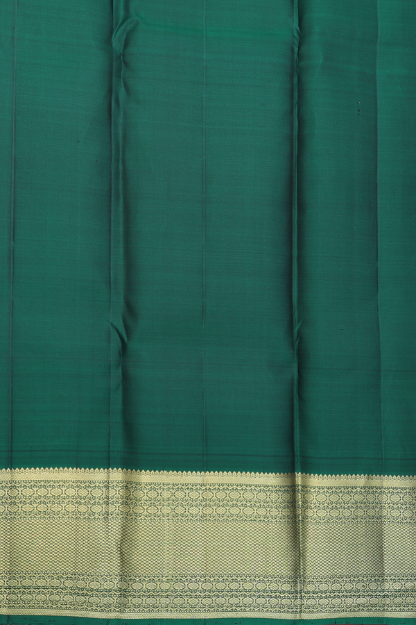 Kanchipuram Silk Saree In Black With Peacock Buttas