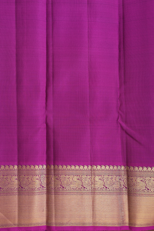 Kanchipuram Silk Saree In Bottle Green With Chakram Buttas