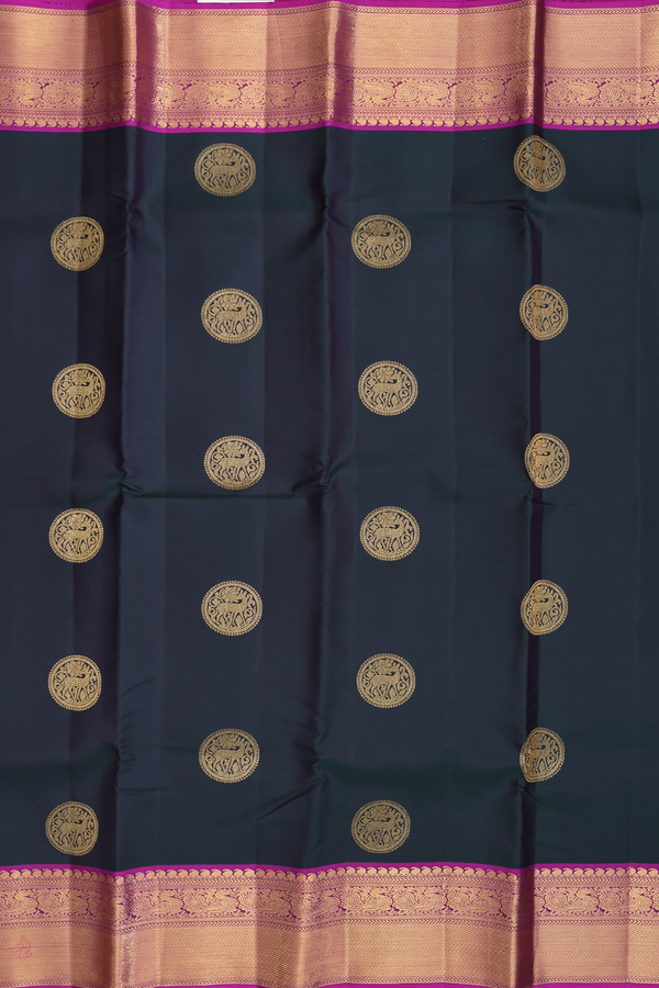 Kanchipuram Silk Saree In Bottle Green With Chakram Buttas