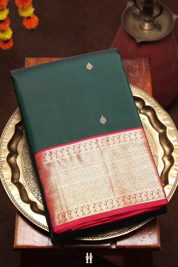Kanchipuram Silk Saree In Dark Green Along Stripes With Buttas
