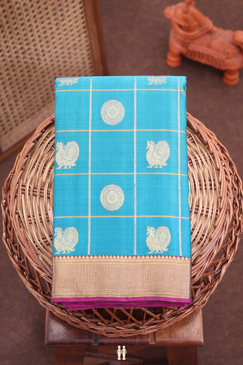 Kanchipuram Silk Saree In Peacock Blue With Checks Along Buttas