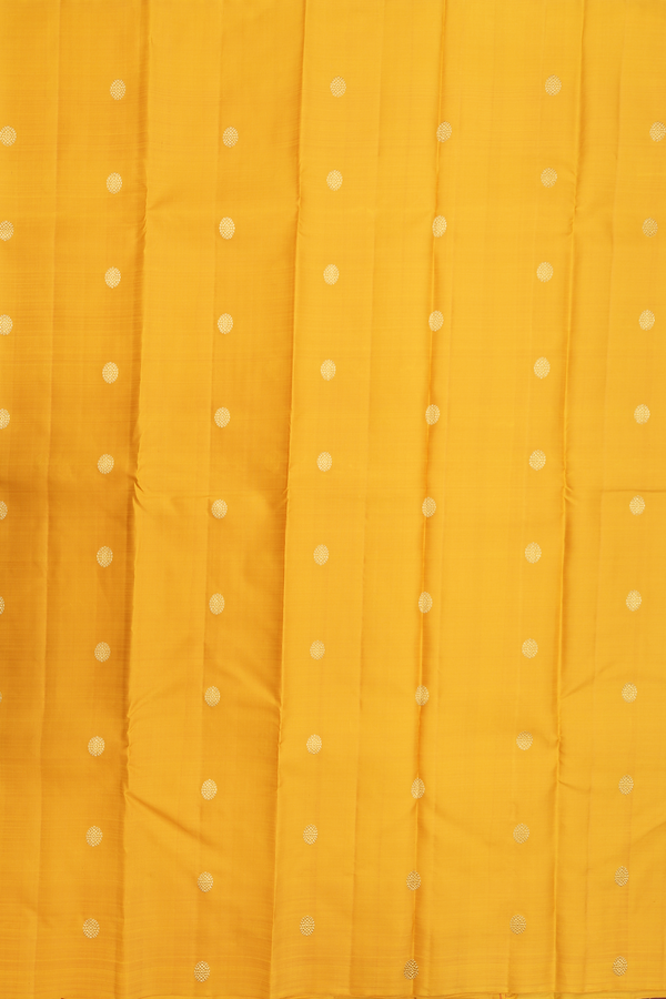 Kanchipuram Silk Saree In Saffron Yellow With Chakram Buttas