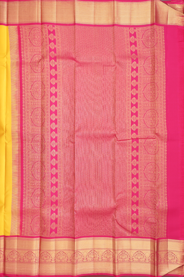 Kanchipuram Silk Saree In Saffron Yellow With Floral Buttas
