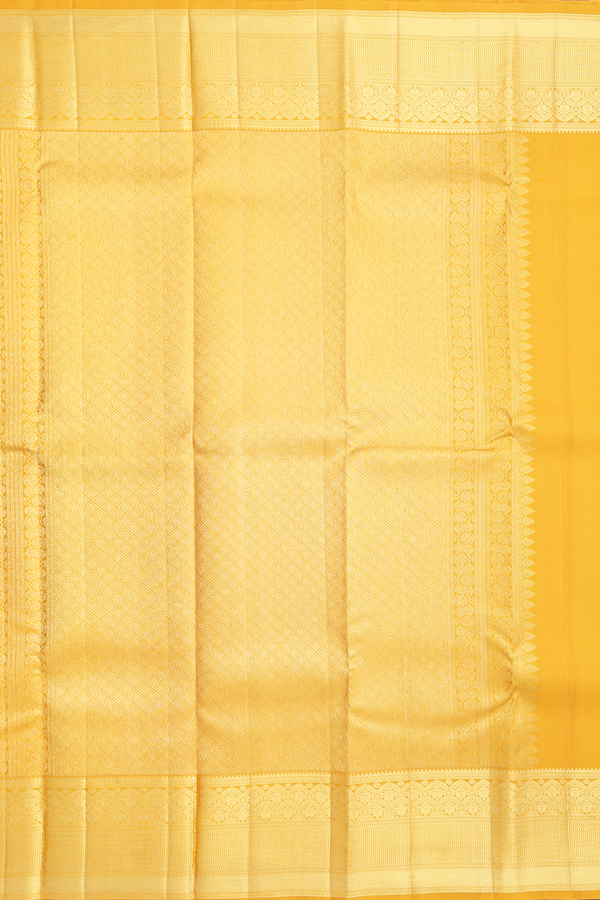 Kanchipuram Silk Saree In Saffron Yellow With Floral Buttas