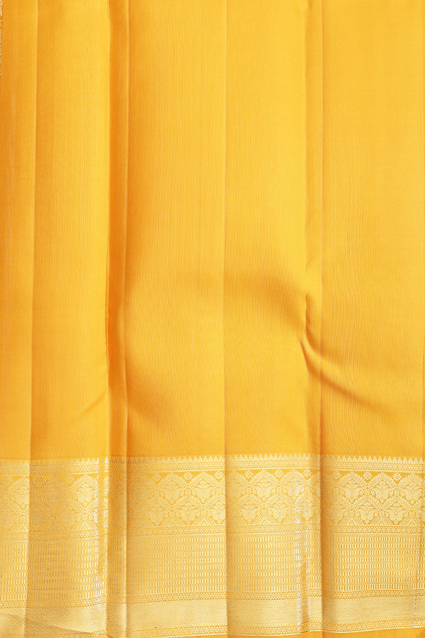 Kanchipuram Silk Saree In Saffron Yellow With Floral Buttas