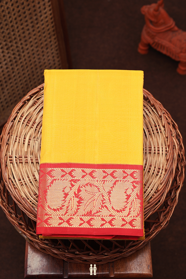 Kanchipuram Silk Saree In Saffron Yellow With Korvai Border