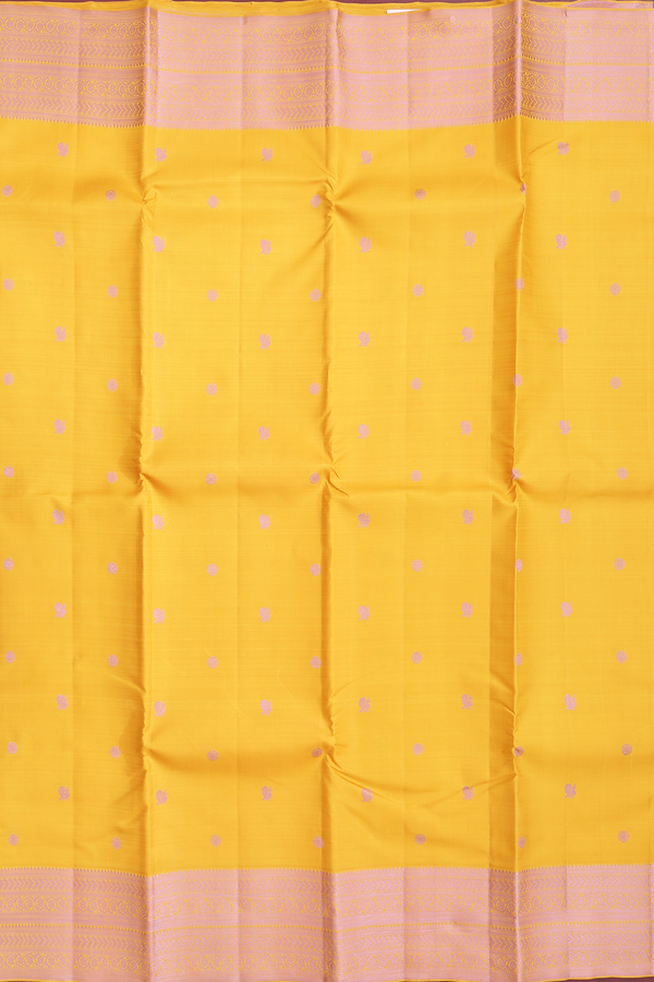 Kanchipuram Silk Saree In Saffron Yellow With Peacock Buttas