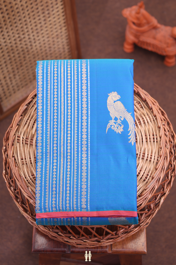 Kanchipuram Silk Saree In Teal Blue Along Stripes With Motifs