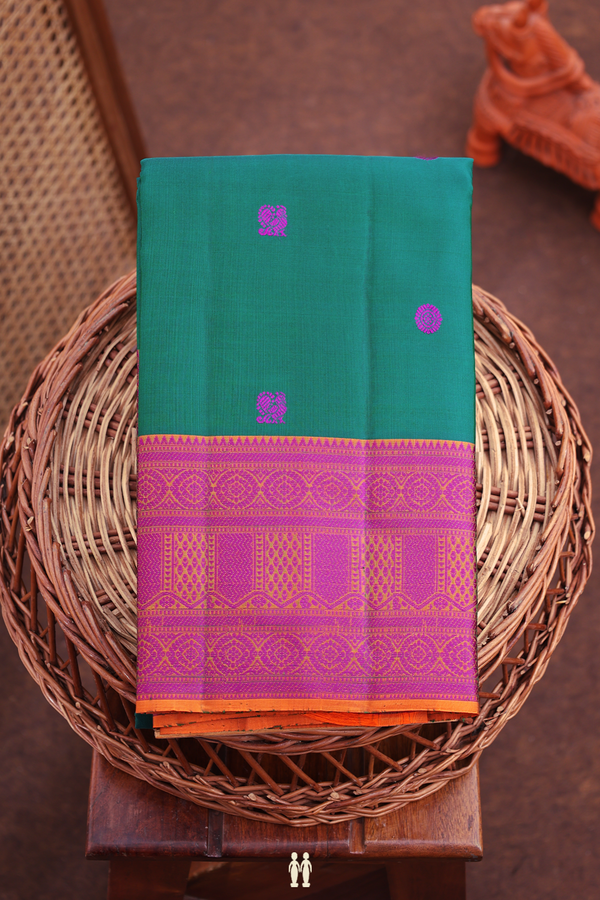 Kanchipuram Silk Saree In Teal Green With Peacock Buttas