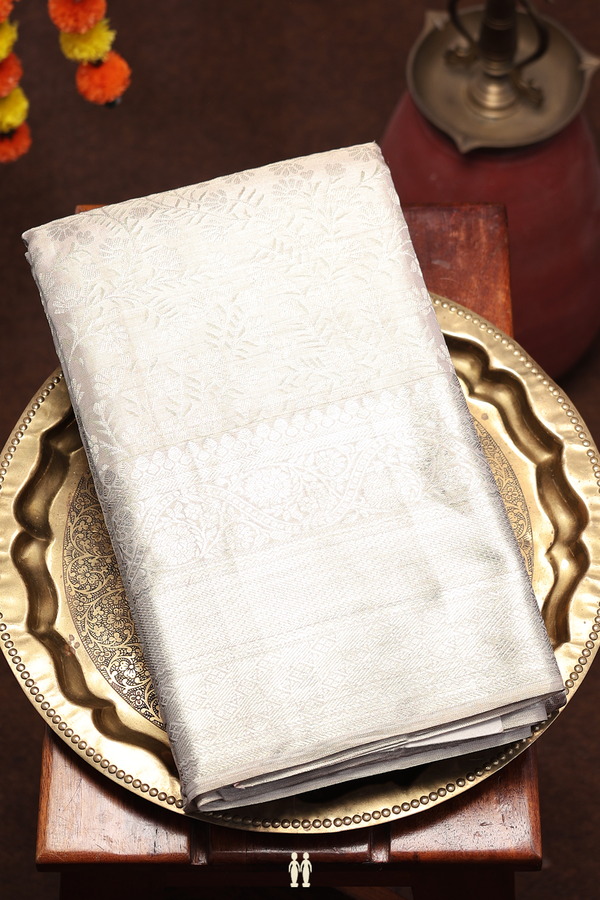 Kanchipuram Silk Saree In White Tissue With Floral Design