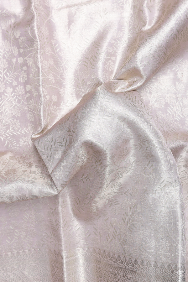 Kanchipuram Silk Saree In White Tissue With Floral Design