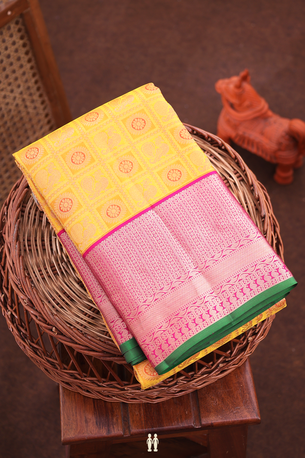Kanchipuram Silk Saree In Yellow With Peacock Design