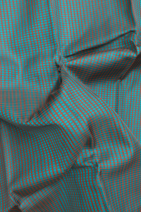 Koorainadu Silk Cotton Saree In Green And Orange With Checks