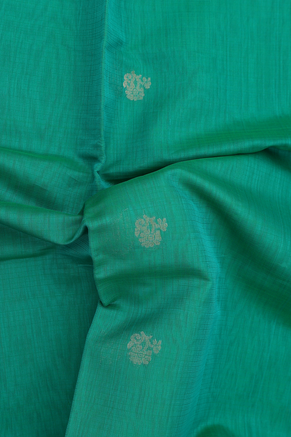 Kora Silk Cotton Saree In Green With Floral Buttas