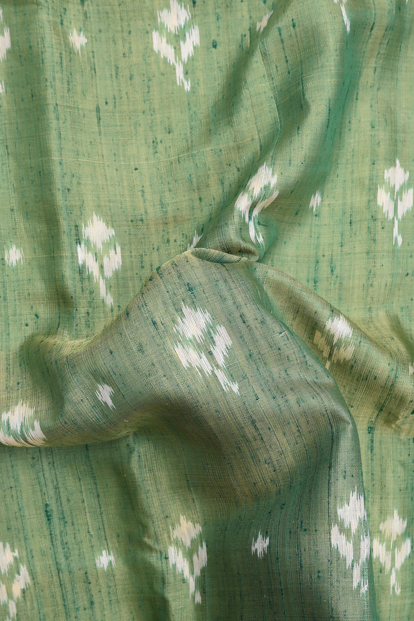 Patola Silk Saree In Green With Printed Buttas