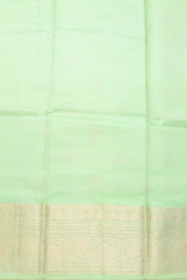 Raw Silk Saree In Mint Green Along Checks With Buttas