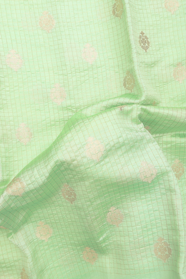 Raw Silk Saree In Mint Green Along Checks With Buttas