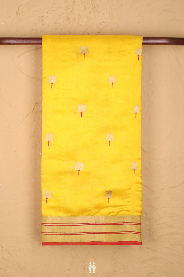 Raw Silk Saree In Saffron Yellow With Floral Buttas