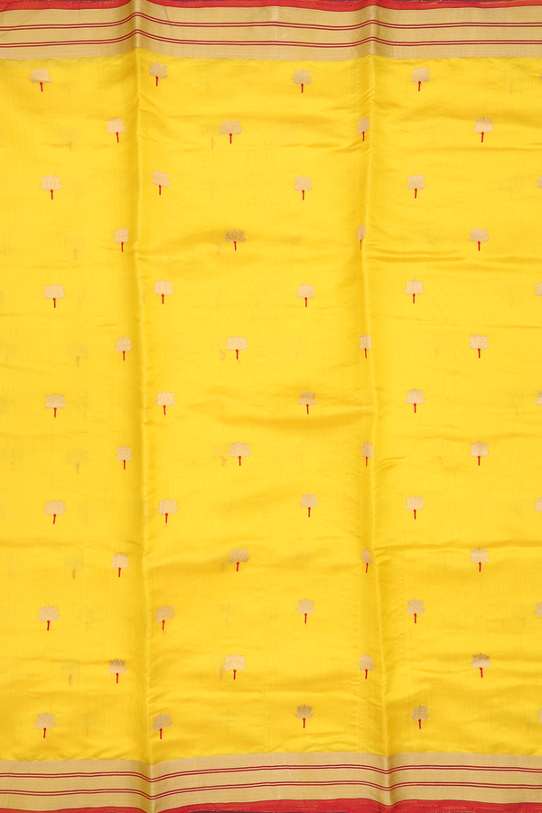 Raw Silk Saree In Saffron Yellow With Floral Buttas