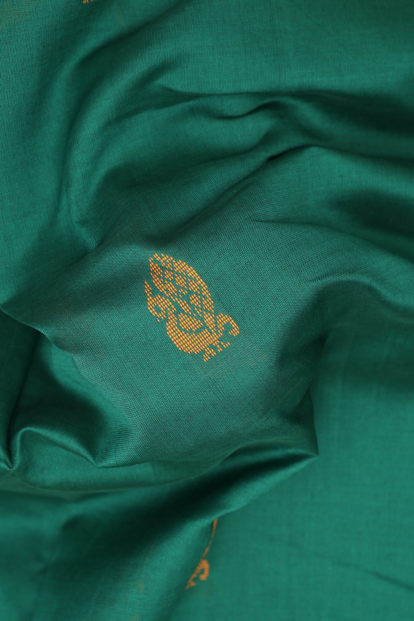 Semi Silk Cotton Saree In Green With Peacock Buttas