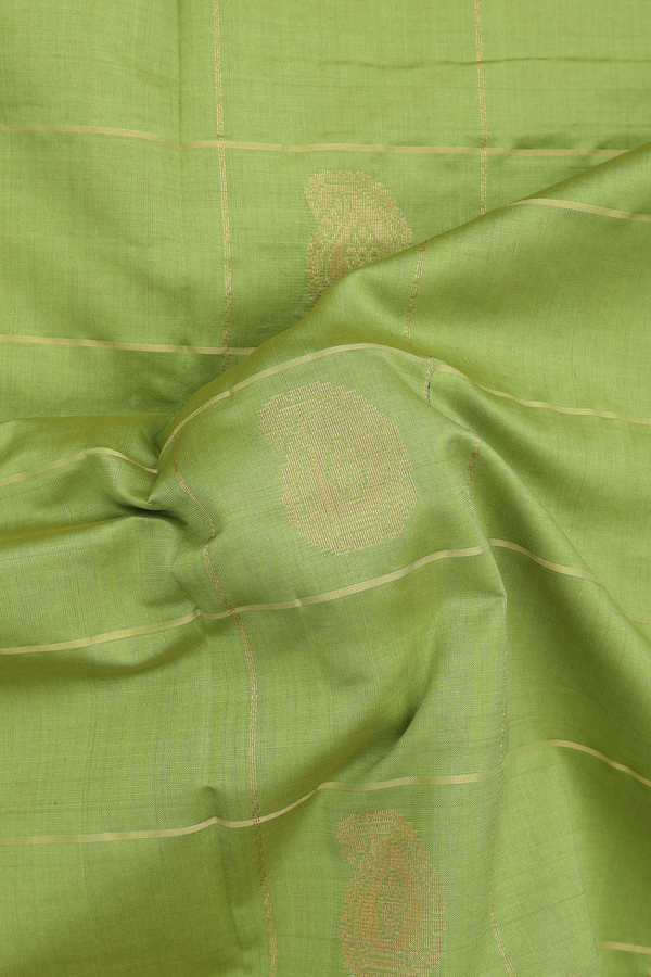 Semi Silk Cotton Saree In Pastel Green With Checks Design