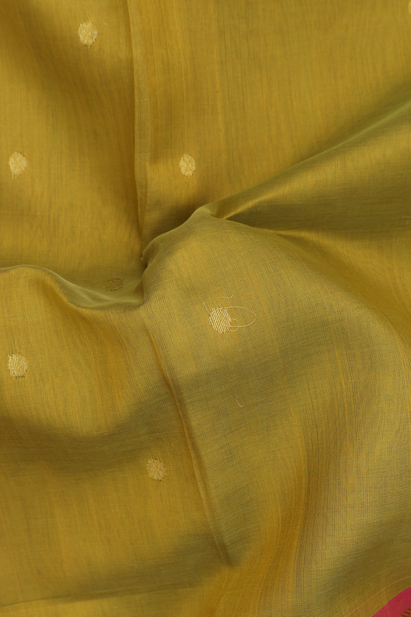 Silk Cotton Saree In Yellowish Brown With Zari Buttas