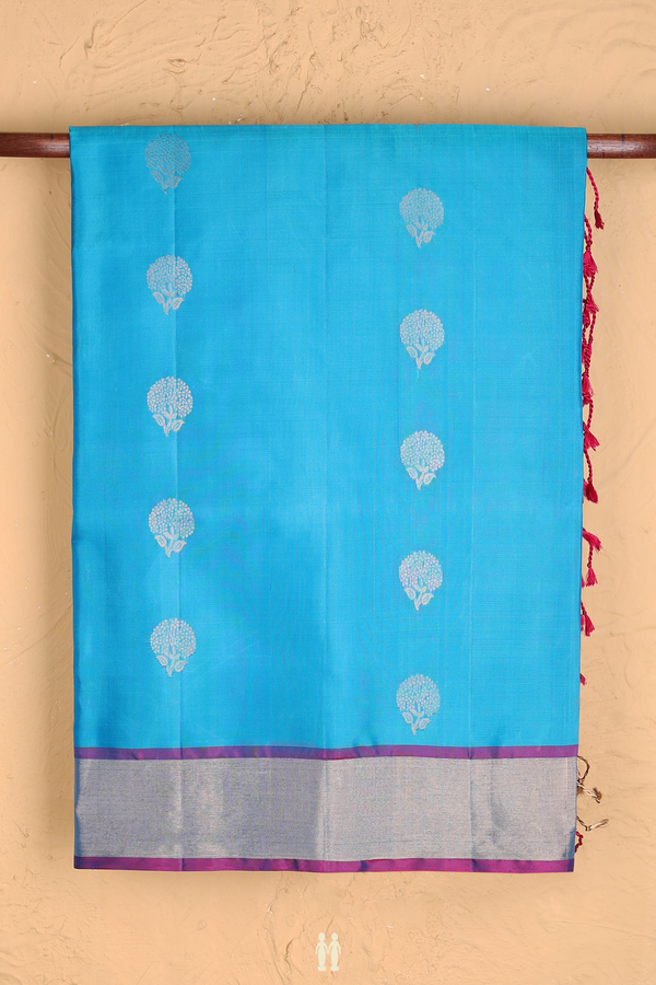 Soft Silk Saree In Blue With Floral Buttas