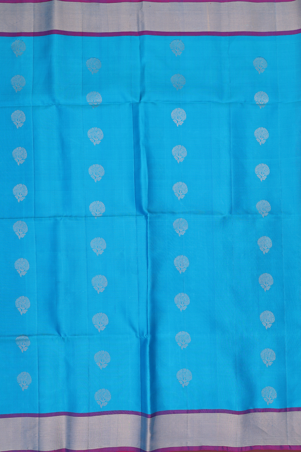 Soft Silk Saree In Blue With Floral Buttas