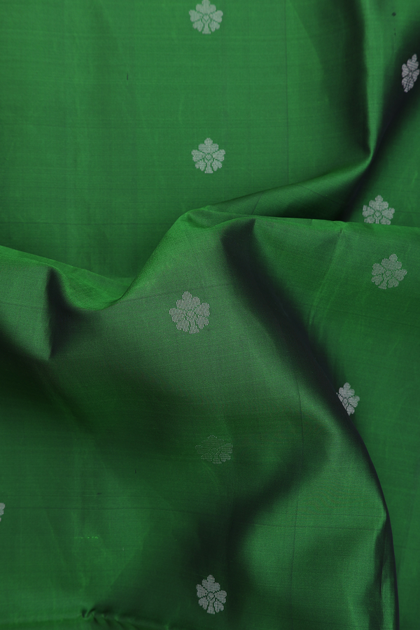 Soft Silk Saree In Emerald Green With Zari Buttas