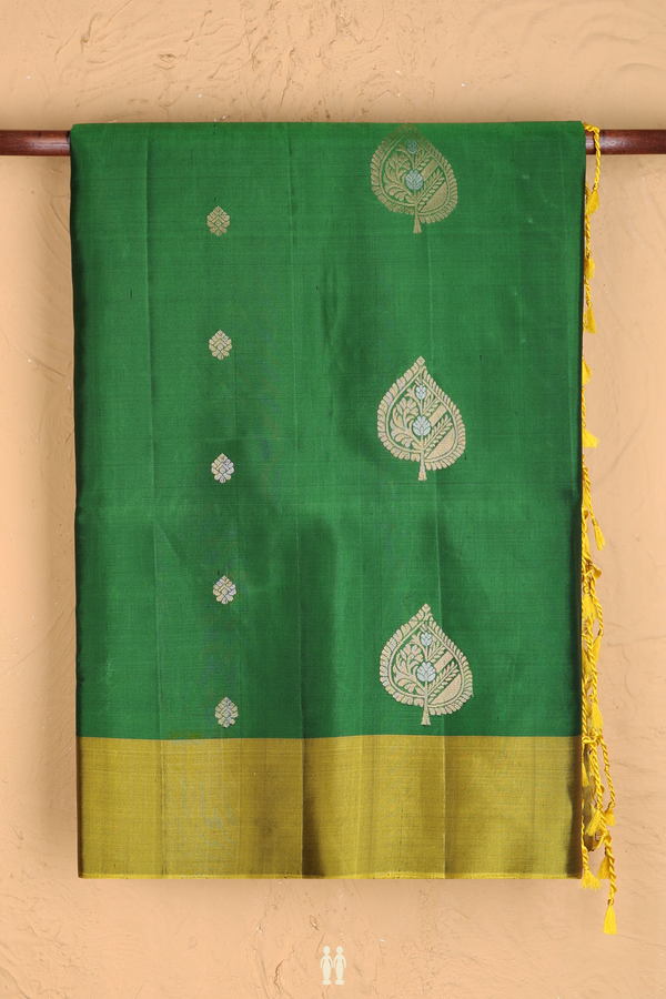 Soft Silk Saree In Green With Leaf Buttas