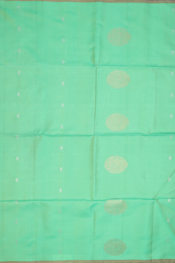 Soft Silk Saree In Green With Peacock Motifs