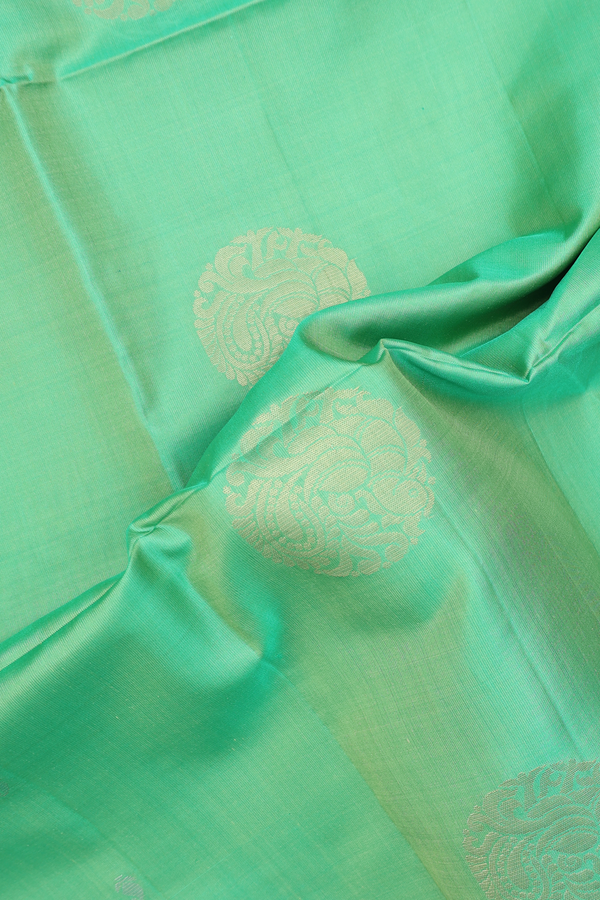 Soft Silk Saree In Green With Peacock Motifs