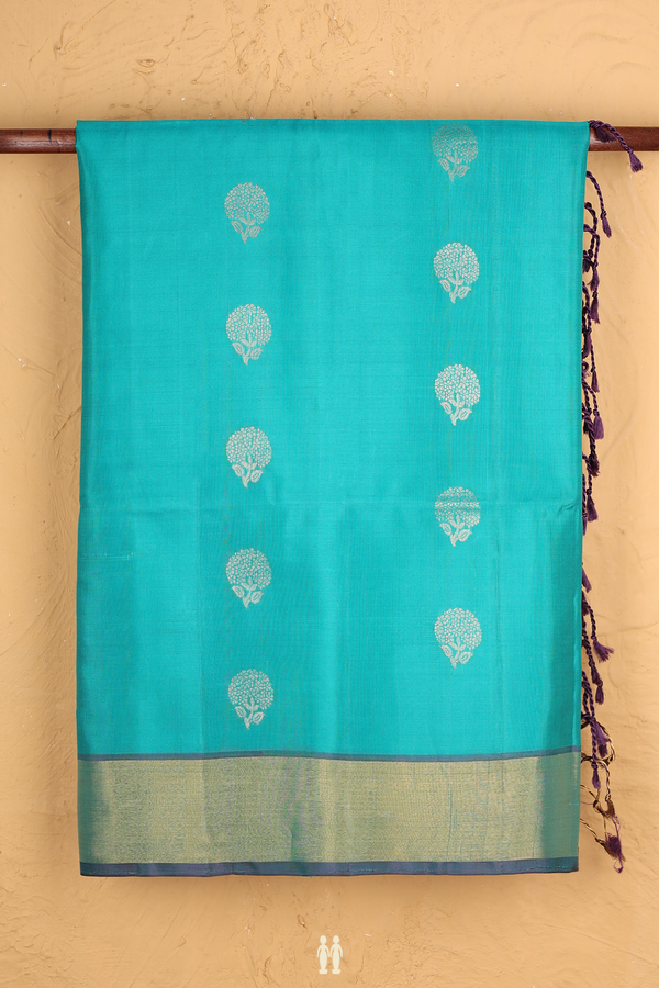 Soft Silk Saree In Greenish Blue With Floral Buttas
