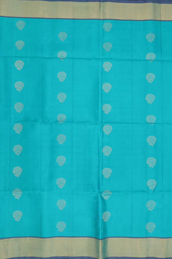 Soft Silk Saree In Greenish Blue With Floral Buttas