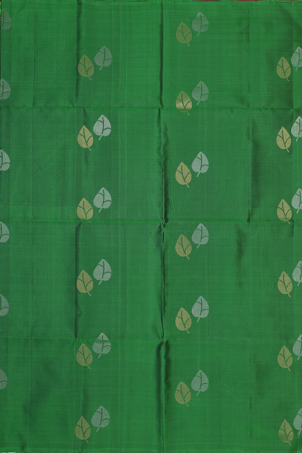 Soft Silk Saree In Leaf Green With Zari Buttas