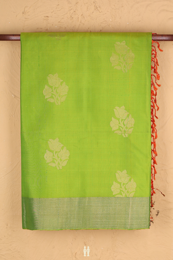 Soft Silk Saree In Lime Green With Floral Buttas