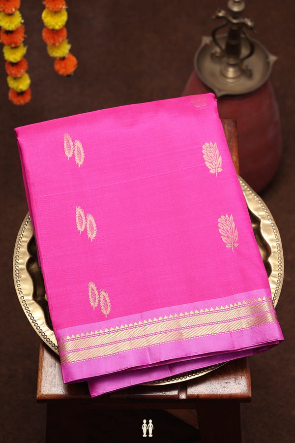 Soft Silk Saree In Magenta With Floral Buttas