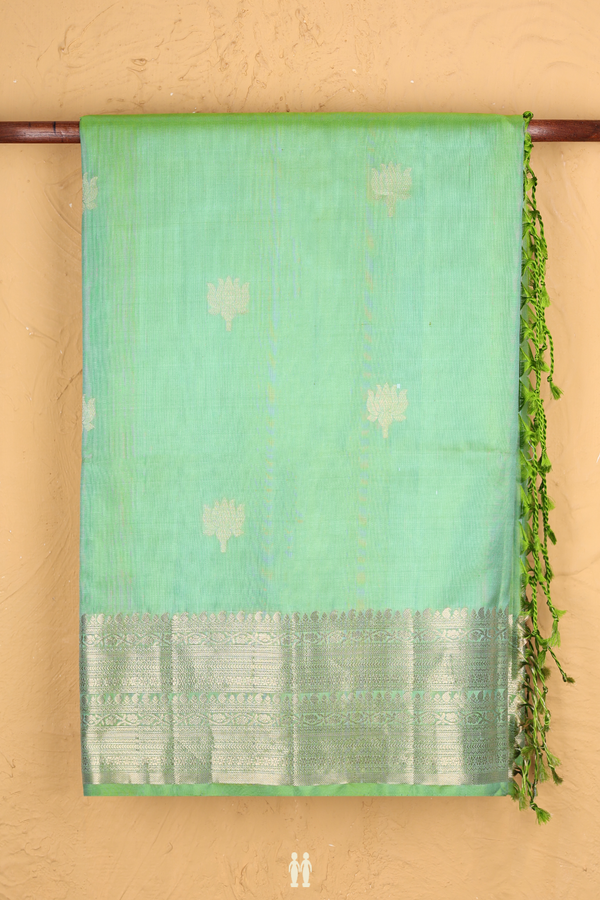 Soft Silk Saree In Moss Green With Floral Buttas